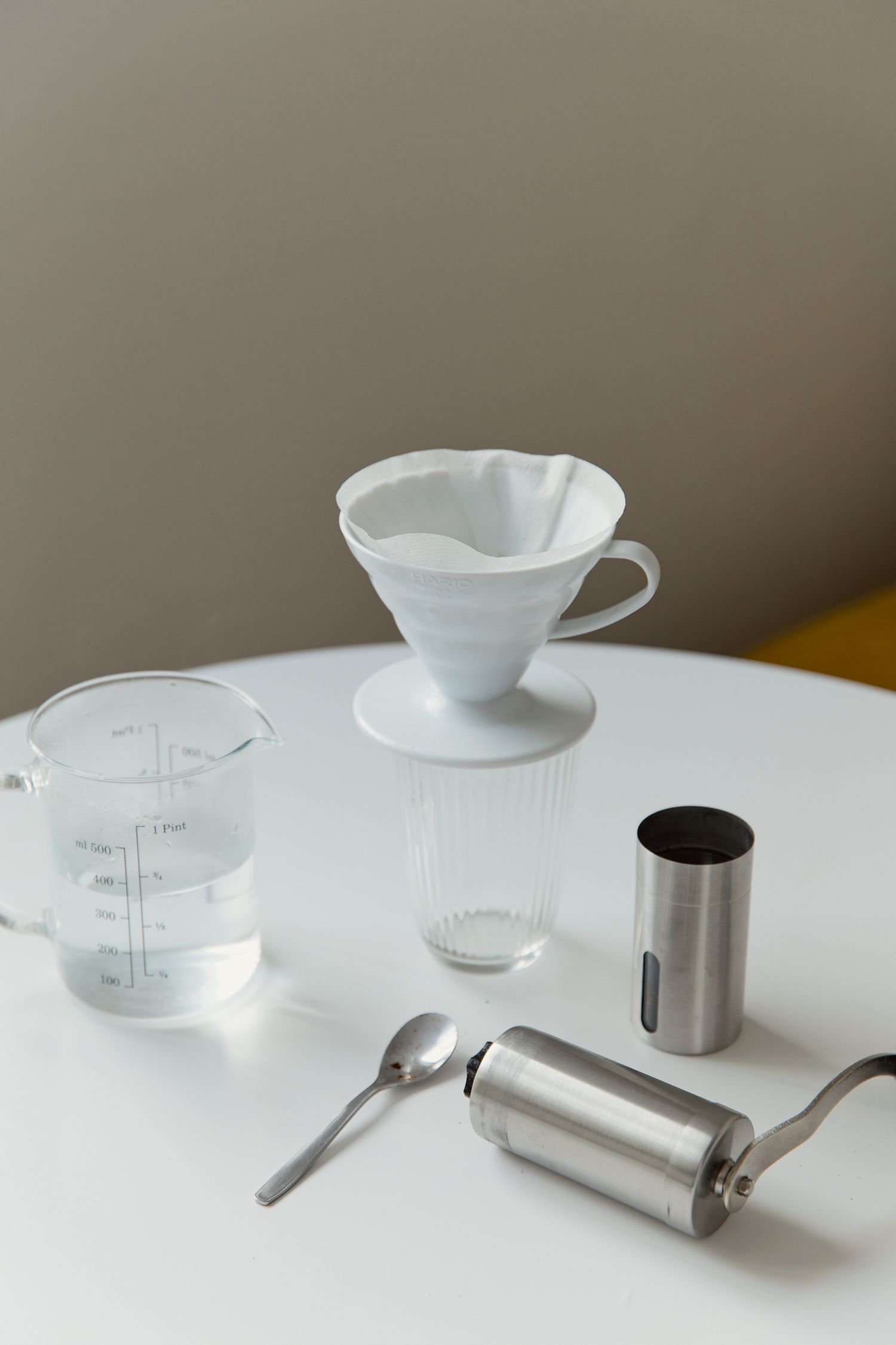 Pour-over coffee dripper on a table