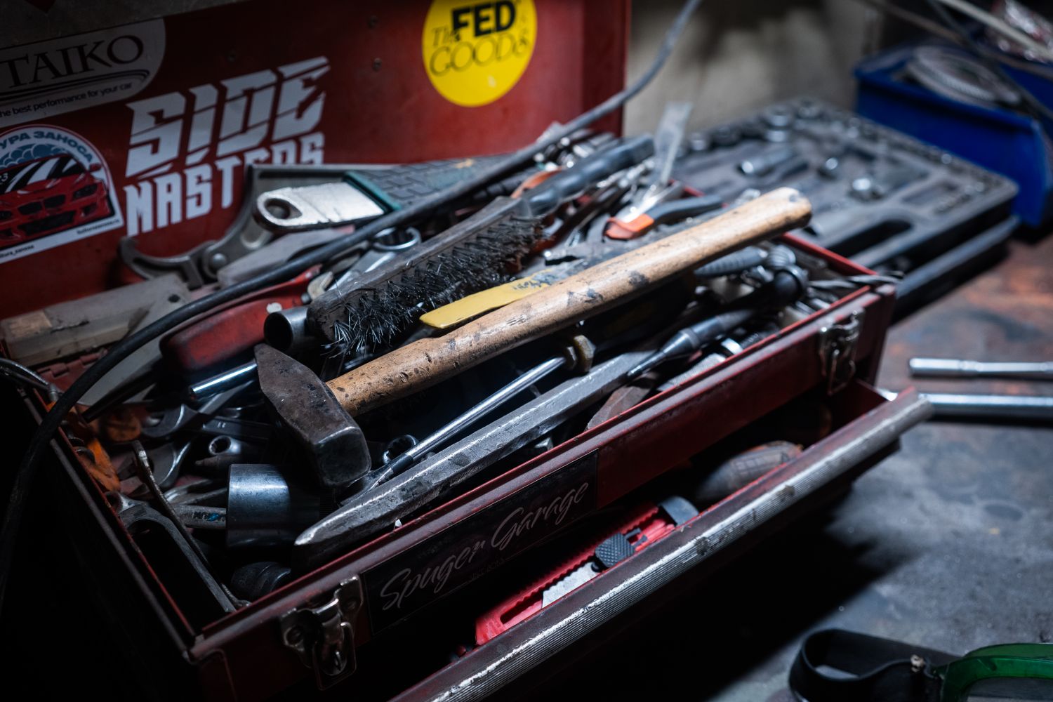 Open toolbox filled with hand tools